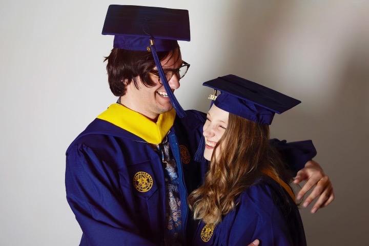 emily and clay in graduation robes